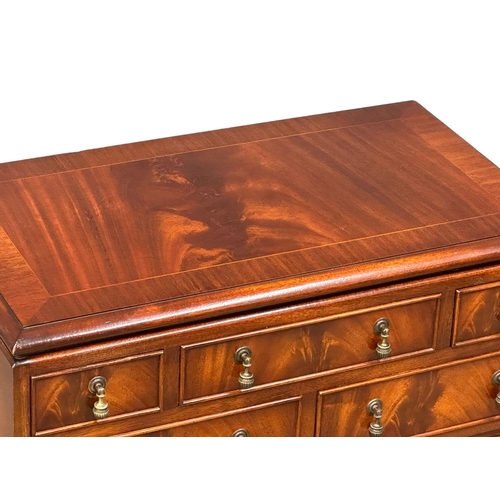 1091 - A Chinese Chippendale style inlaid mahogany chest of drawers. 70x40.5x75.5cm (10)