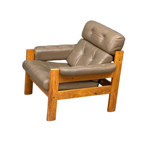 1113 - A Norwegian ‘Montana’ Mid Century teak and leather armchair by Ekorness. 1970. (6)