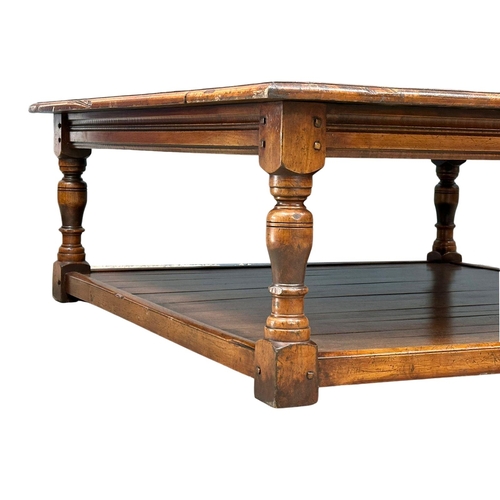 1134 - A large elm and birch country house 2 tier coffee table. 124x122x47.5cm (5)