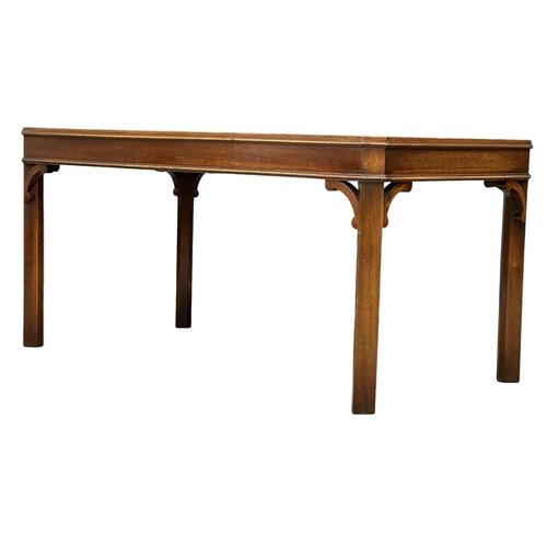 1137 - A mahogany coffee table. 108x57x52cm (5)