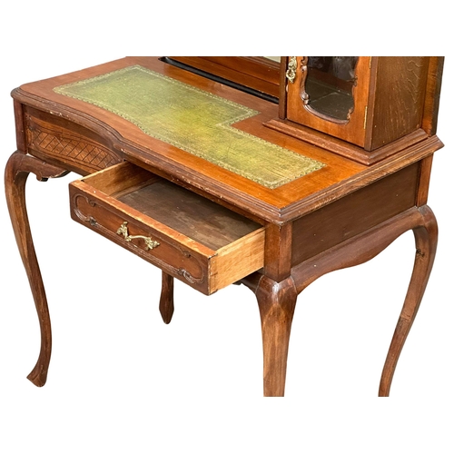 1141 - A late Victorian mahogany ladies desk with leather top and drawer on cabriole legs. Circa 1900. 77x4... 