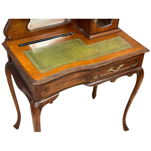 1141 - A late Victorian mahogany ladies desk with leather top and drawer on cabriole legs. Circa 1900. 77x4... 