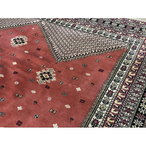 1186 - A very large good quality Moroccan hand knotted rug. 280x405cm