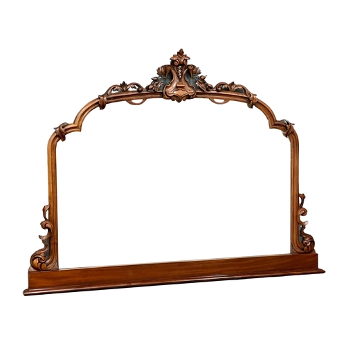 1195 - A large Victorian carved mahogany framed over-mantle mirror. 150x112cm (5)