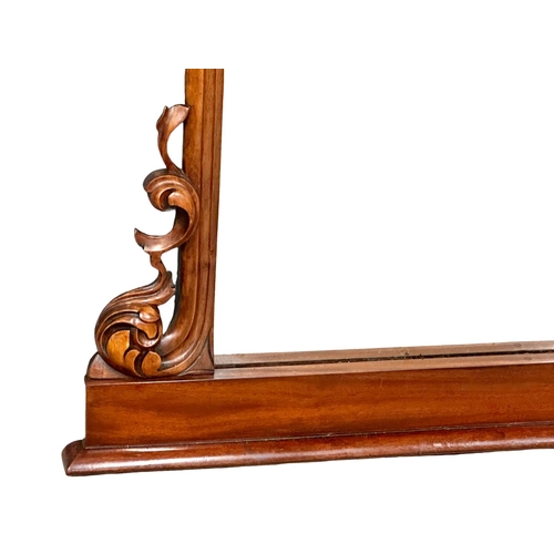 1195 - A large Victorian carved mahogany framed over-mantle mirror. 150x112cm (5)