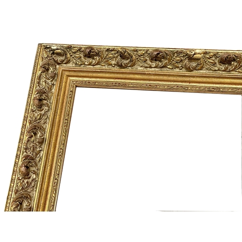 159 - A good quality ornate gilt framed mirror .91x70cm