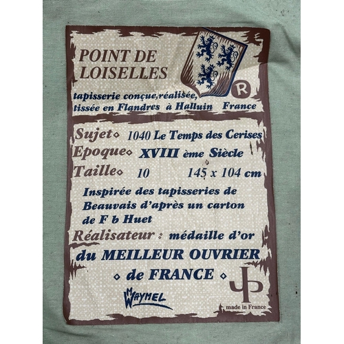 279E - A French tapestry wall hanging. Point De Loiselles Du Meilleur Ouvrier de France. 100.5x142.5cm