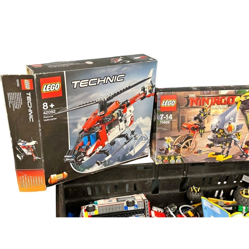 615 - A large collection of LEGO. LEGO Jurassic World, LEGO DC Wonder Woman, LEGO Ninjago, LEGO Technic He... 