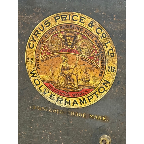 65G - An early 20th century safe. Cyrus Price & Co LTD, Wolverhampton. Little & McClean LTD, Belfast. 51x5... 