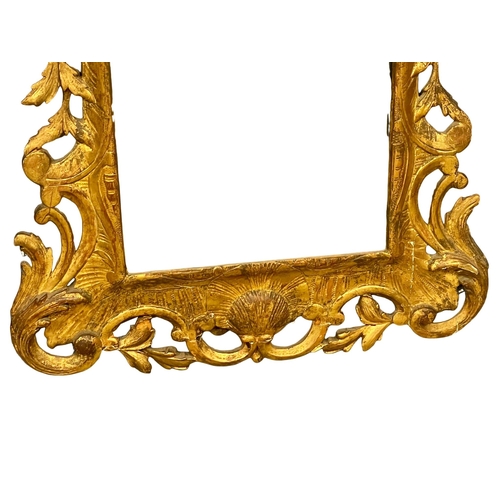 806 - A George III gilt framed wall mirror. Circa 1790-1810. 60.5x96cm