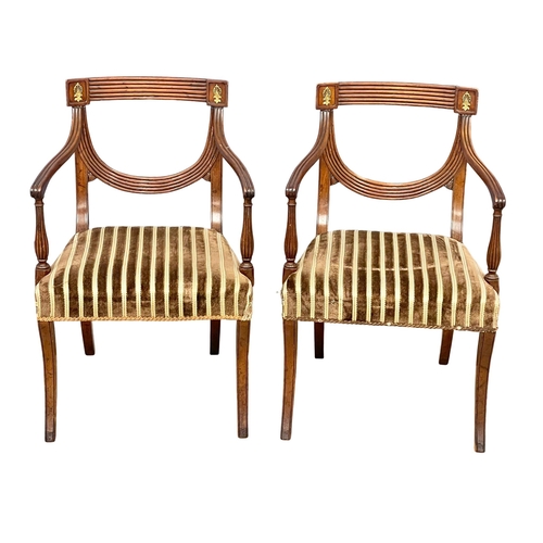 808 - A set of 8 good quality late Regency mahogany dining chairs with Reeded Splat backs and brass mounts... 