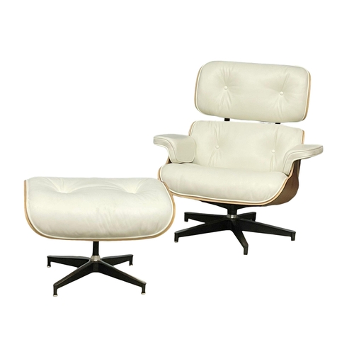 811 - A good quality Charles & Ray Eames style rosewood and leather swivel chair with ottoman. (13)