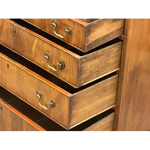 813 - A fine proportioned early George III mahogany oak lined chest of drawers with original brass drop ha... 