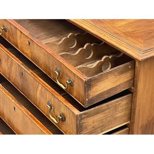 813 - A fine proportioned early George III mahogany oak lined chest of drawers with original brass drop ha... 