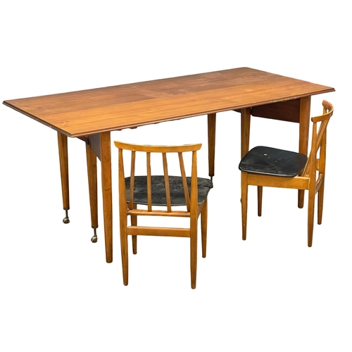 814 - An Elliots of Newbury Mid Century teak dining set. Highboard with retracting drop leaf dining table ... 