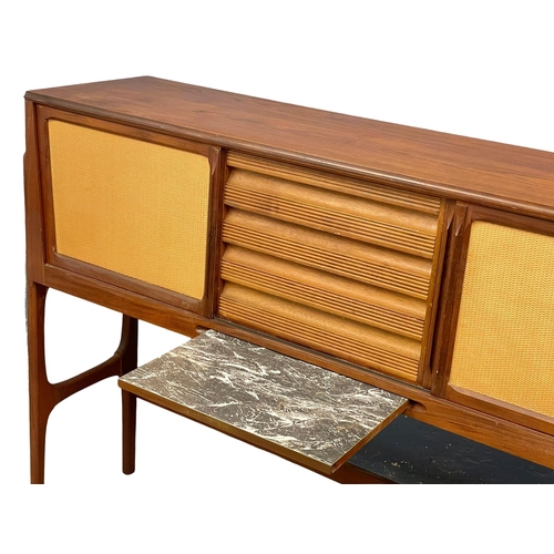 814 - An Elliots of Newbury Mid Century teak dining set. Highboard with retracting drop leaf dining table ... 