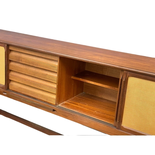 814 - An Elliots of Newbury Mid Century teak dining set. Highboard with retracting drop leaf dining table ... 