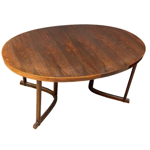 819 - An excellent quality Danish rosewood 2 leaf extending dining table. 1960’s. Closed 163x109x72.5cm. 2... 