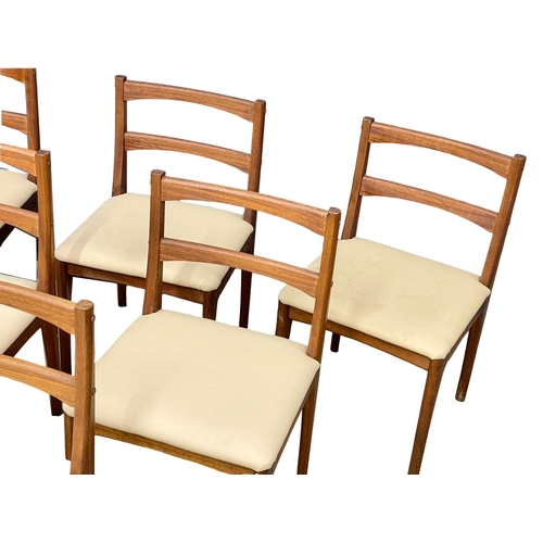 821 - A set of 6 Mid Century teak dining chairs. (13)