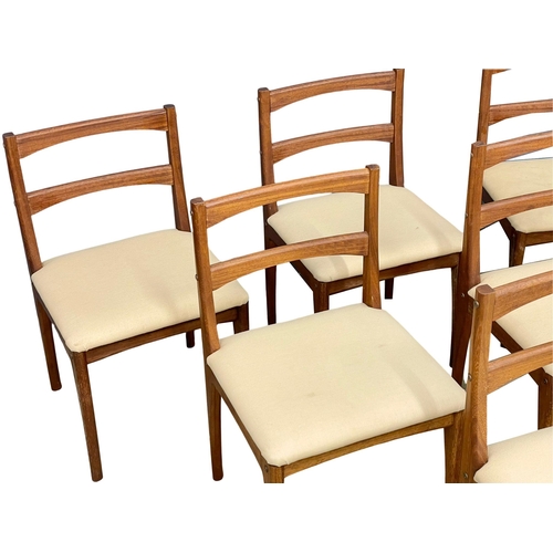 821 - A set of 6 Mid Century teak dining chairs. (13)