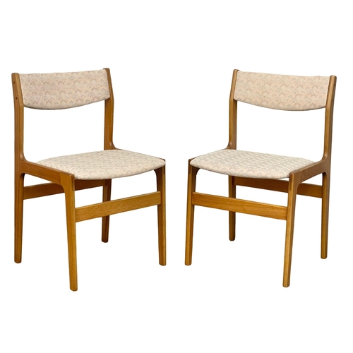 822 - A set of 6 Danish Mid Century teak dining chairs designed by Erik Buch. (11)