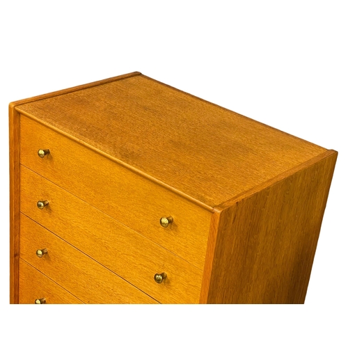 825 - A G-Plan Librenza oak Tallboy chest of drawers. E.Gomme. 60.5x41x128.5cm (12)