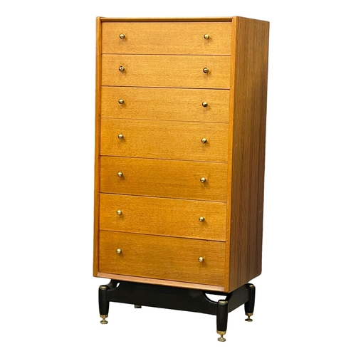 825 - A G-Plan Librenza oak Tallboy chest of drawers. E.Gomme. 60.5x41x128.5cm (12)