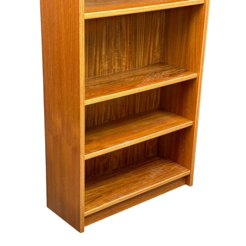 829 - A large Danish Mid Century teak open bookcase/ shelving unit. 83x32x193.5cm (8)