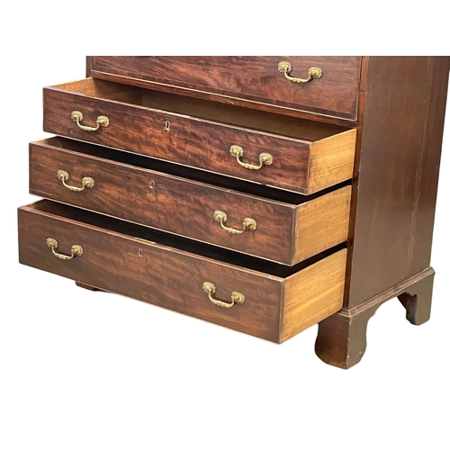 831 - A George III inlaid mahogany secretaire chest of drawers with original brass drop handles on bracket... 