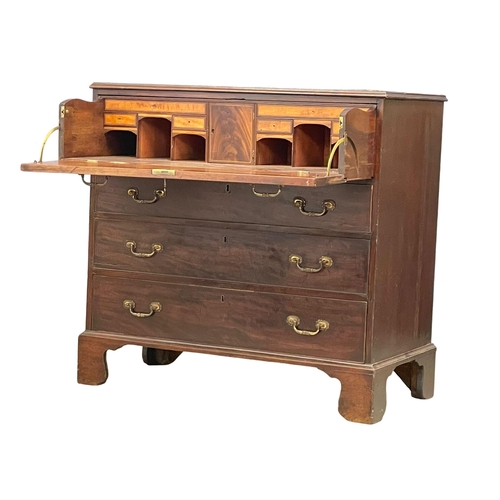 831 - A George III inlaid mahogany secretaire chest of drawers with original brass drop handles on bracket... 