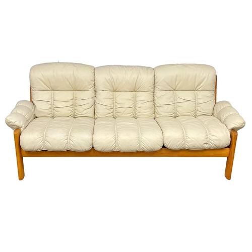 834 - A 2 piece Norwegian Mid Century teak and leather suite by Ekorness. 1970’s. 3 seater 211cm. 2 seater... 