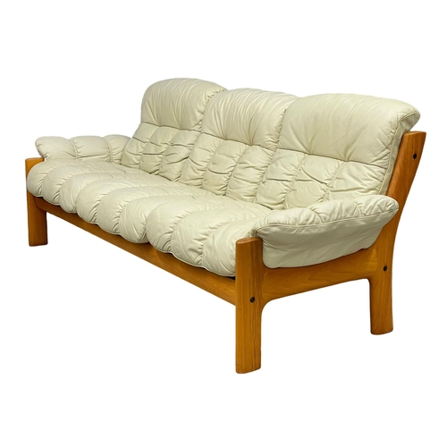 834 - A 2 piece Norwegian Mid Century teak and leather suite by Ekorness. 1970’s. 3 seater 211cm. 2 seater... 