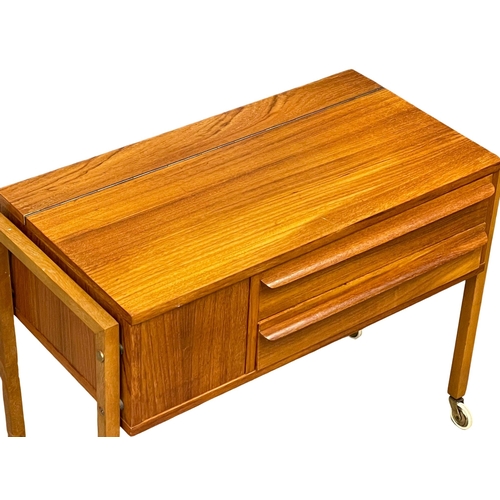 837 - A Danish Mid Century teak sewing box.  73x37x57cm (12)