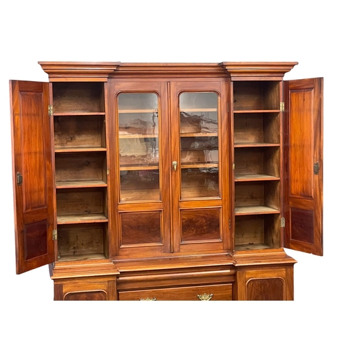 841 - A large Victorian mahogany breakfront bookcase. 163x56x224cm (5)