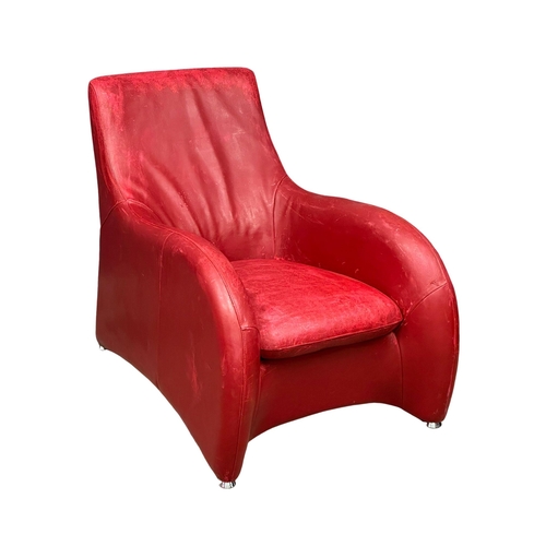 849 - A leather ‘Loge’ lounge chair and stool designed by Gerard van den Berg for Montis. (5)