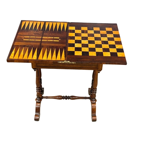 874 - An excellent quality Victorian rosewood turnover games table / lamp table, on cabriole legs and stre... 