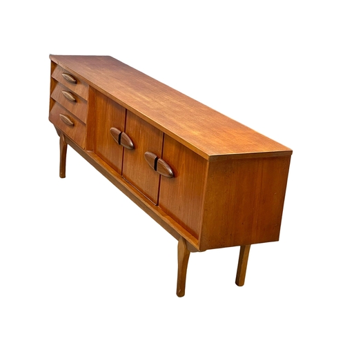 877 - A 1960’s Mid Century teak Long John sideboard by Jentique. 213x42x77cm (11)