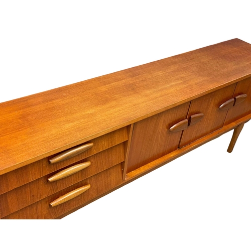 877 - A 1960’s Mid Century teak Long John sideboard by Jentique. 213x42x77cm (11)