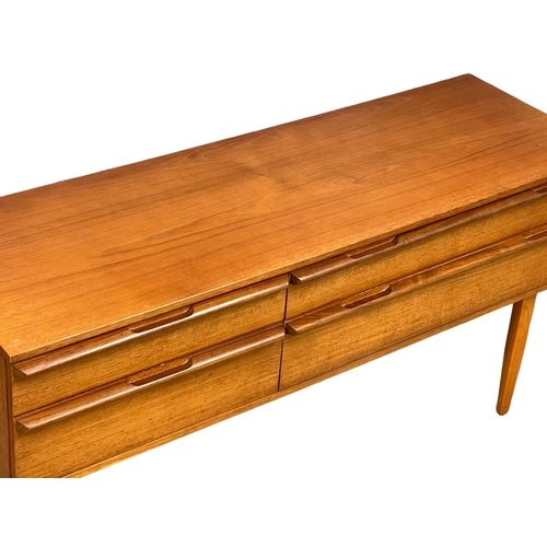 878 - A Mid Century teak sideboard by Avalon. 1960’s. 132.5xx43x66cm (11)