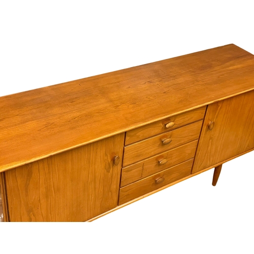 880 - A 1960’s Mid Century Elm sideboard by Scandart. 179x48.5x79cm (11)