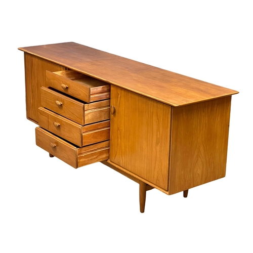 880 - A 1960’s Mid Century Elm sideboard by Scandart. 179x48.5x79cm (11)