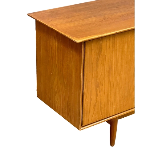 880 - A 1960’s Mid Century Elm sideboard by Scandart. 179x48.5x79cm (11)