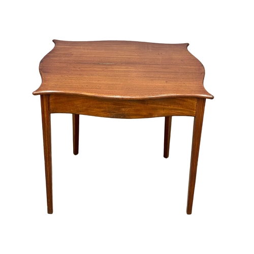 881 - A George III mahogany Serpentine front turnover tea table, circa 1790-1800. 87x46x75.5cm (1)