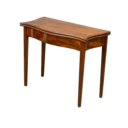 881 - A George III mahogany Serpentine front turnover tea table, circa 1790-1800. 87x46x75.5cm (1)