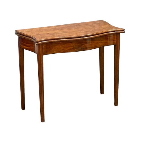 881 - A George III mahogany Serpentine front turnover tea table, circa 1790-1800. 87x46x75.5cm (1)