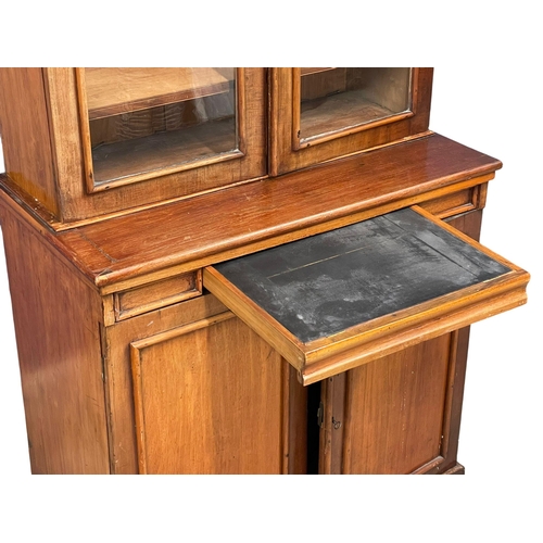 882 - A Victorian mahogany secretaire  bookcase, with double glazed door and adjustable shelves. 85x52x210... 