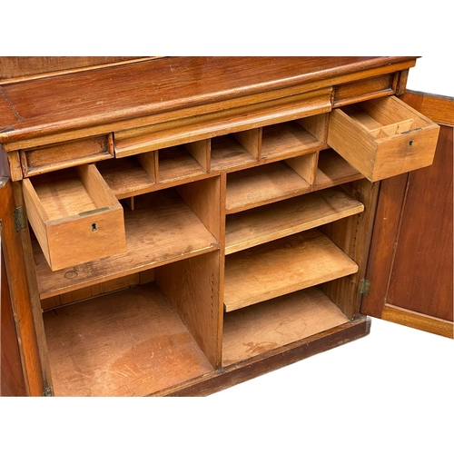 882 - A Victorian mahogany secretaire  bookcase, with double glazed door and adjustable shelves. 85x52x210... 