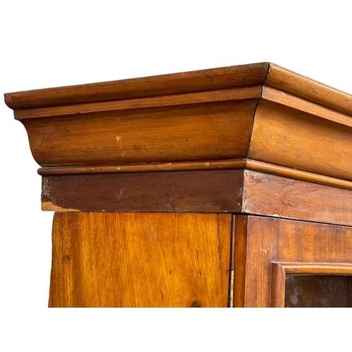 882 - A Victorian mahogany secretaire  bookcase, with double glazed door and adjustable shelves. 85x52x210... 