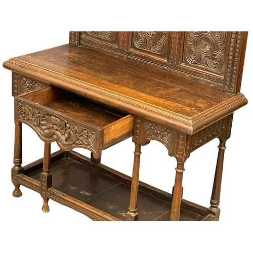 883 - A good quality 19th century Jacobean Revival oak buffet console table with carved Man of the Forest ... 