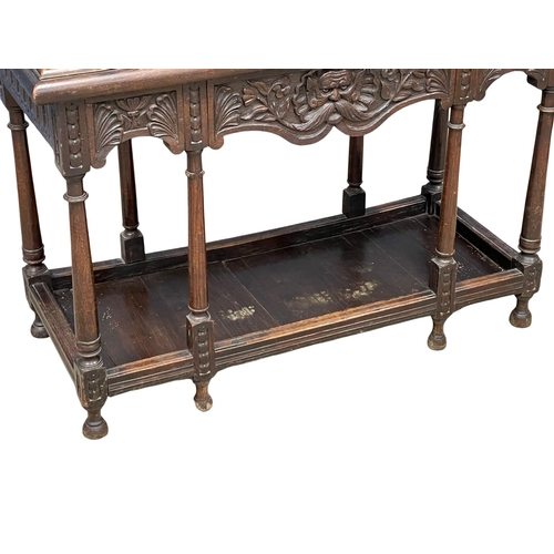 883 - A good quality 19th century Jacobean Revival oak buffet console table with carved Man of the Forest ... 